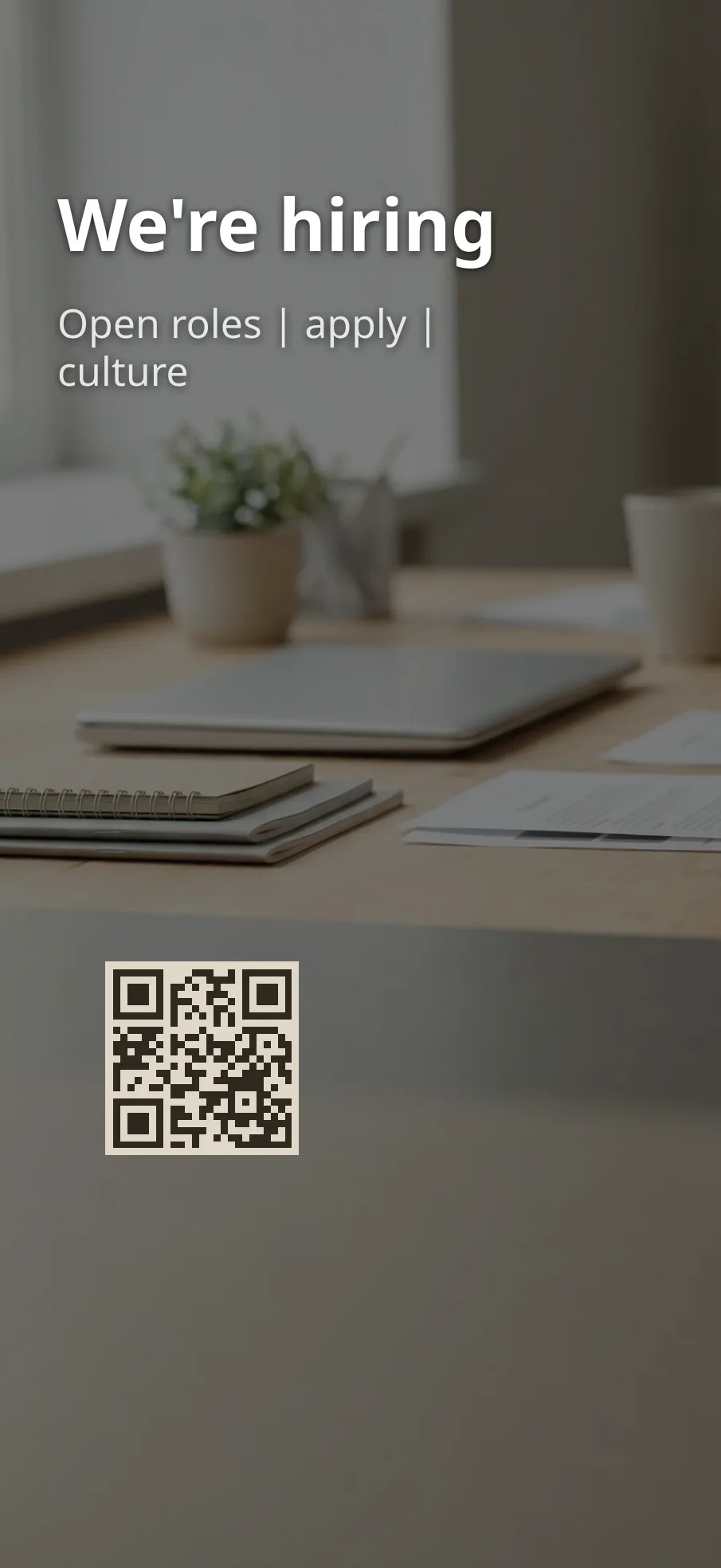Lock screen wallpaper with a QR code linking to a careers page.
